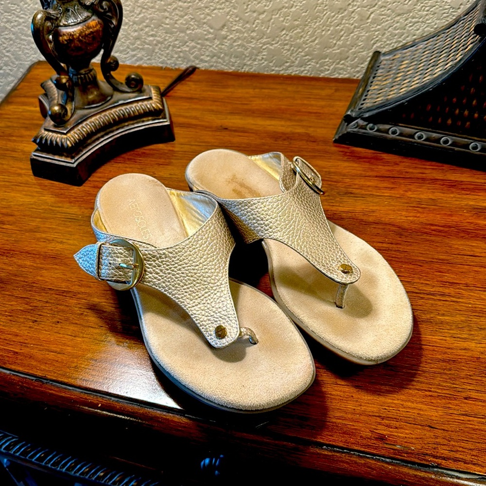 Shimmer soft gold Aerosoles sandals.
